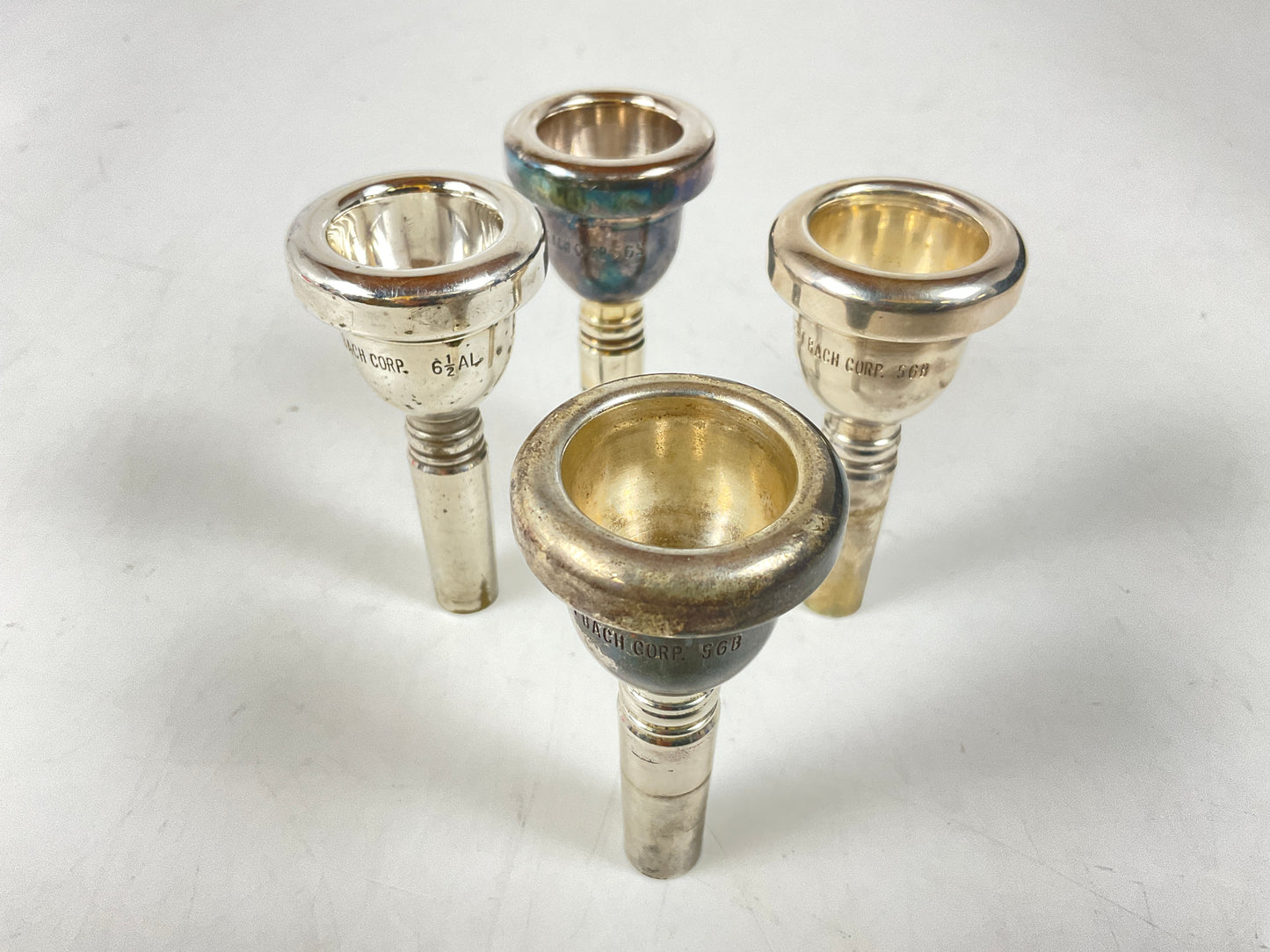 Used Trombone Mouthpiece Lot 86: Four Large Shank Bach [93996]