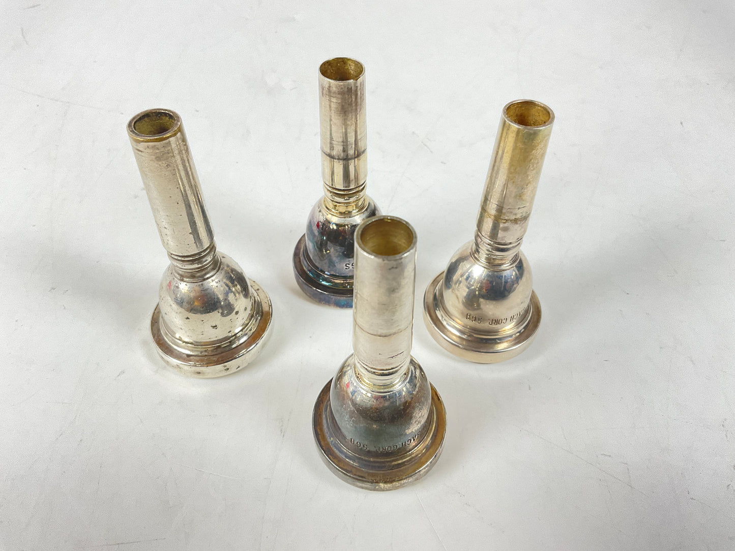 Used Trombone Mouthpiece Lot 86: Four Large Shank Bach [93996]