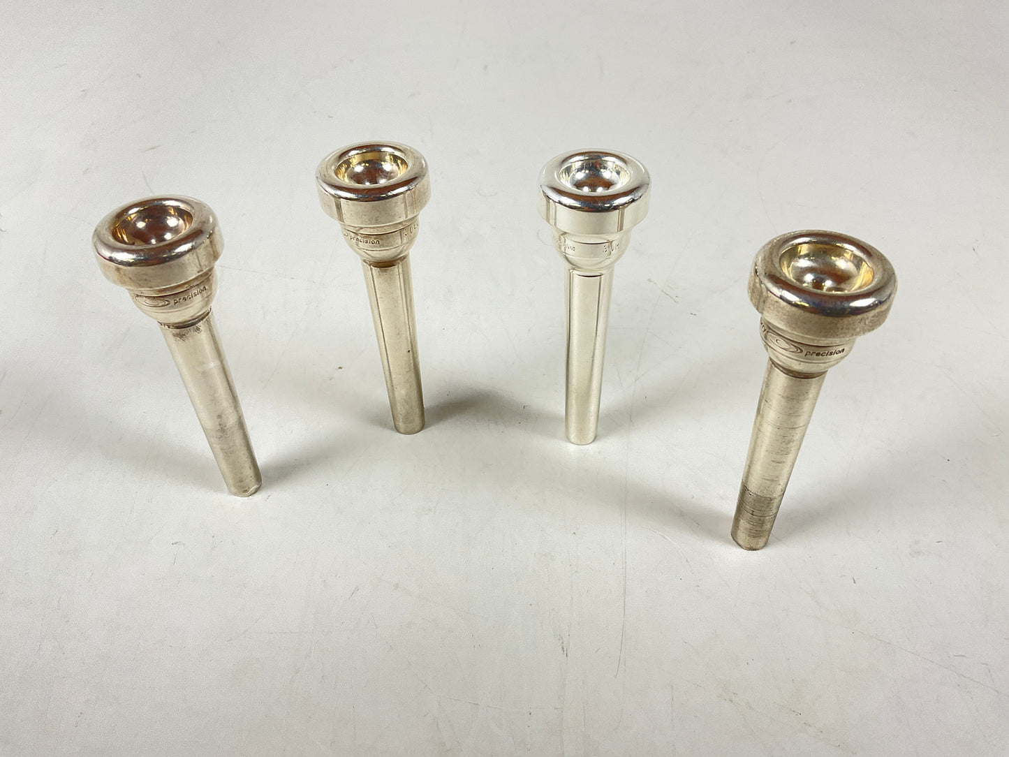 Used Trumpet Mouthpiece Lot 91: Four Curry Mouthpieces [82135]