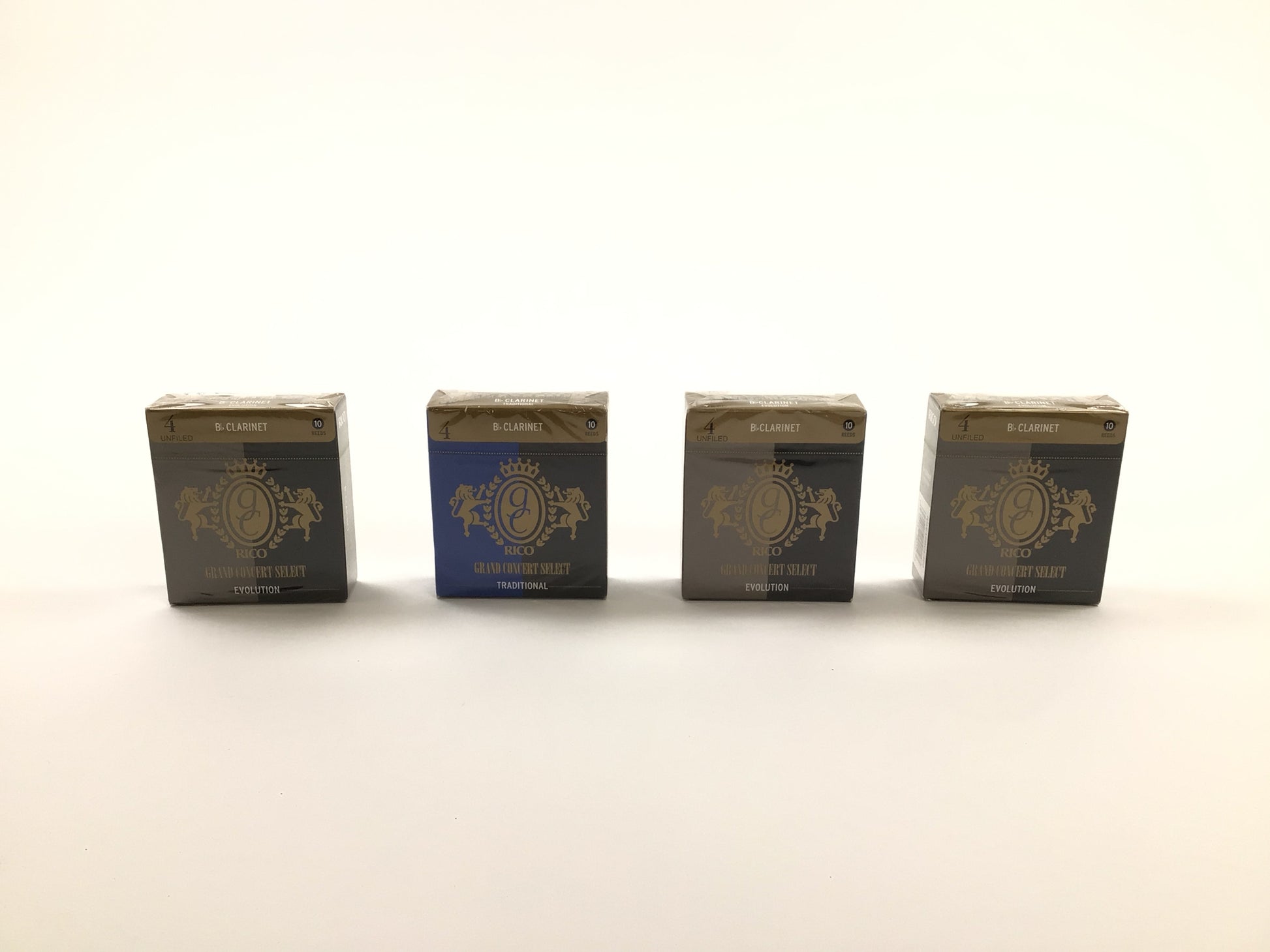 Reed Lot 25: Four Boxes of Rico Bb Clarinet Reeds, Strength 4. Three Boxes of 10, Grand Select Evolution; One Box of 10, Grand Concert Select Traditional [082]